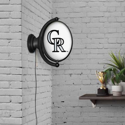 Colorado Rockies: Original Oval Rotating Lighted Wall Sign - The Fan-Brand