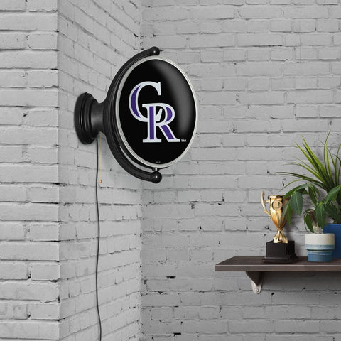 Colorado Rockies: Original Oval Rotating Lighted Wall Sign - The Fan-Brand