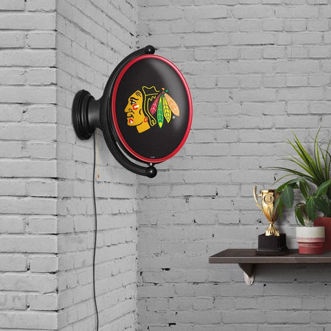 Chicago Blackhawks: Original Oval Rotating Lighted Wall Sign - The Fan-Brand