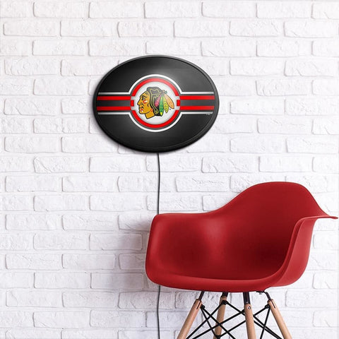 Chicago Blackhawks: Oval Slimline Lighted Wall Sign - The Fan-Brand