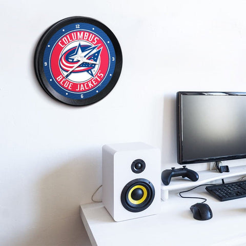 Columbus Blue Jackets: Ribbed Frame Wall Clock - The Fan-Brand