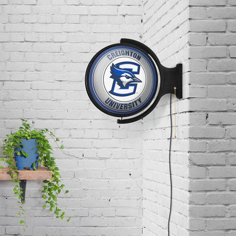 Creighton Bluejays: Original Round Rotating Lighted Wall Sign - The Fan-Brand