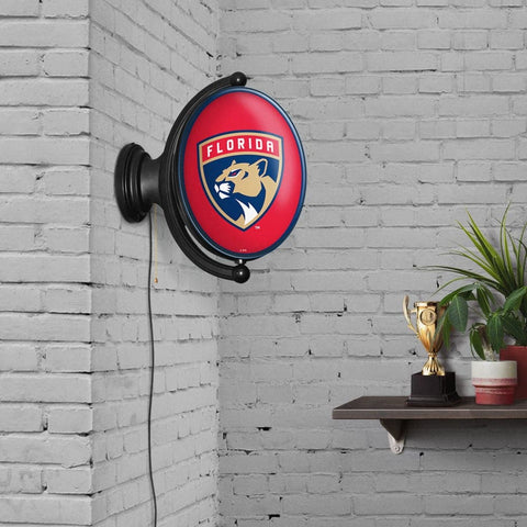 Florida Panthers: Original Oval Rotating Lighted Wall Sign - The Fan-Brand