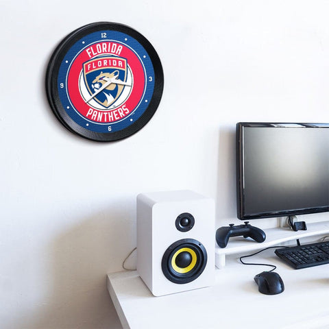 Florida Panthers: Ribbed Frame Wall Clock - The Fan-Brand