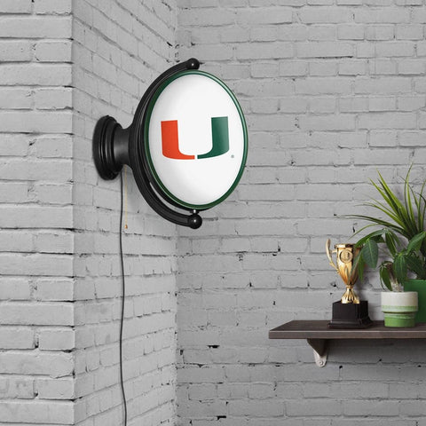 Miami Hurricanes: Original Oval Rotating Lighted Wall Sign - The Fan-Brand