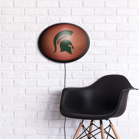 Michigan State Spartans: Pigskin - Oval Slimline Lighted Wall Sign - The Fan-Brand