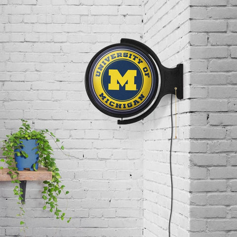 Michigan Wolverines: Original Round Rotating Lighted Wall Sign - The Fan-Brand