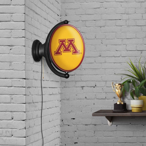 Minnesota Golden Gophers: Original Oval Rotating Lighted Wall Sign - The Fan-Brand