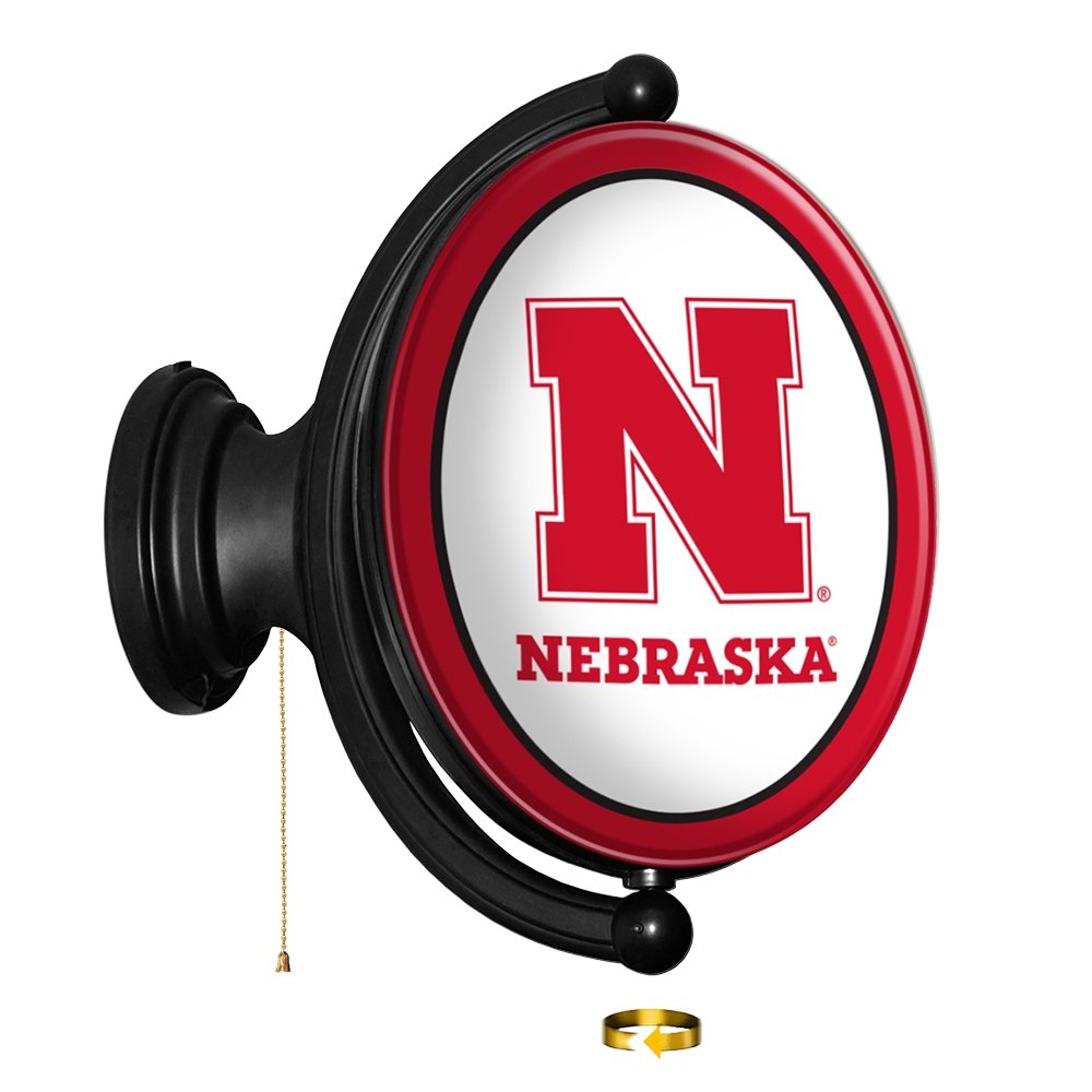 Nebraska Cornhuskers: Huskers - Original Oval Rotating Lighted Wall Sign - The Fan-Brand