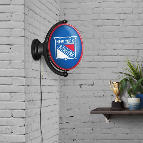 New York Rangers: Original Oval Rotating Lighted Wall Sign - The Fan-Brand