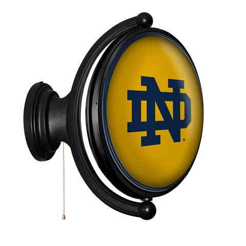 Notre Dame Fighting Irish: Original Oval Rotating Lighted Wall Sign - The Fan-Brand