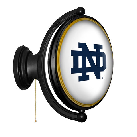 Notre Dame Fighting Irish: Original Oval Rotating Lighted Wall Sign - The Fan-Brand