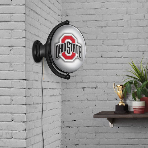 Ohio State Buckeyes: Double-Sided Original Oval Rotating Lighted Wall Sign - The Fan-Brand