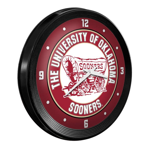 Oklahoma Sooners: Wagon - Ribbed Frame Wall Clock - The Fan-Brand