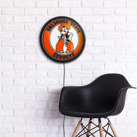 Oklahoma State Cowboys: Pistol Pete - Round Slimline Lighted Wall Sign - The Fan-Brand