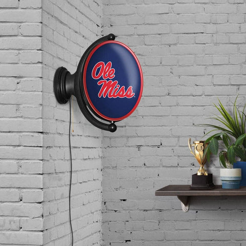 Ole Miss Rebels: Original Oval Rotating Lighted Wall Sign - The Fan-Brand
