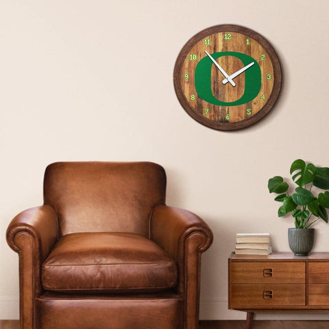 Oregon Ducks: Faux Barrel Top Wall Clock - The Fan-Brand