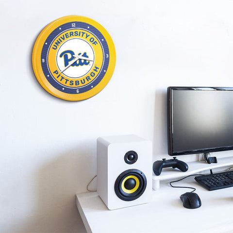 Pitt Panthers: Ribbed Frame Wall Clock - The Fan-Brand