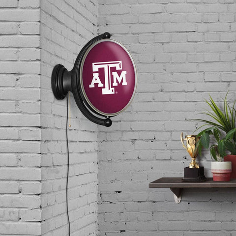 Texas A&M Aggies: Original Oval Rotating Lighted Wall Sign - The Fan-Brand