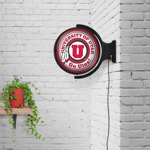 Utah Utes: Original Round Rotating Lighted Wall Sign - The Fan-Brand