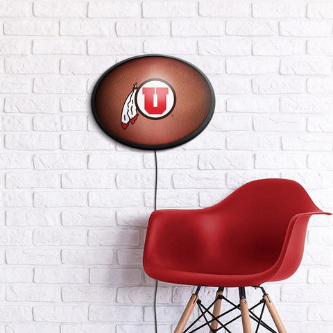 Utah Utes: Pigskin - Oval Slimline Lighted Wall Sign - The Fan-Brand