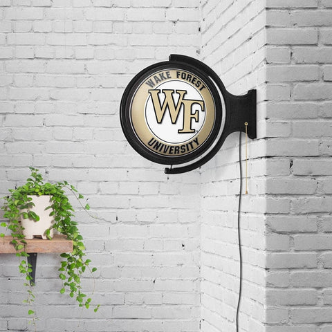 Wake Forest Demon Deacons: Original Round Rotating Lighted Wall Sign - The Fan-Brand