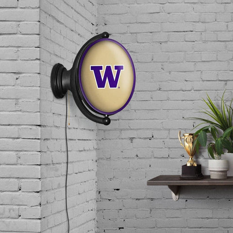 Washington Huskies: Original Oval Rotating Lighted Wall Sign - The Fan-Brand