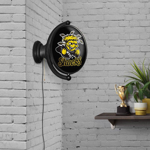 Wichita State Shockers: Original Oval Rotating Lighted Wall Sign - The Fan-Brand